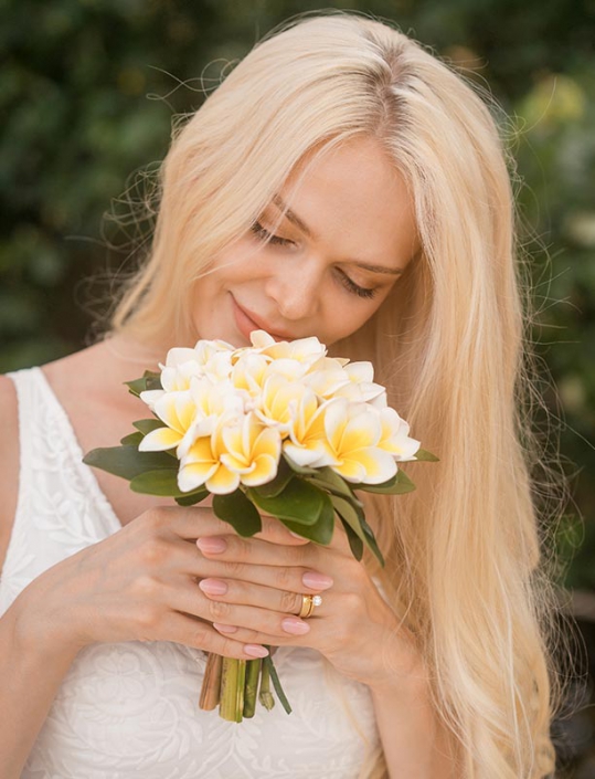 This photo shows a bride portrait with Frangipani bouquet